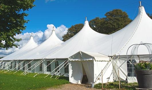 a line of sleek and modern portable restrooms ready for use at an upscale corporate event in Danvers MA